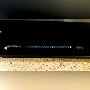 ZALES BLUE TOPAZ STERLING SILVER TENNIS BRACELET